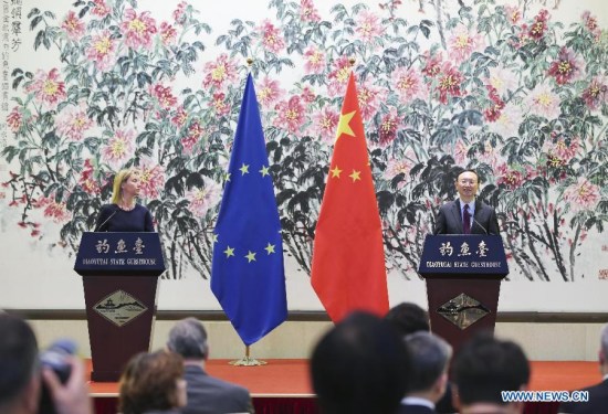 Chinese State Councilor Yang Jiechi (R) and Federica Mogherini, European Union (EU) High Representative for Foreign Affairs and Security Policy and Vice President of the European Commission, attend a press conference after the fifth round of high-level strategic dialogue between China and the EU, in Beijing, capital of China, May 5, 2015. (Xinhua/Ding Lin)