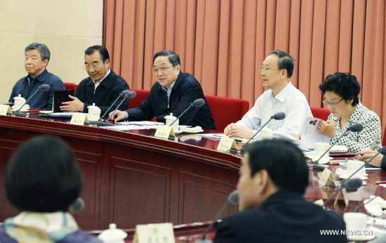 Yu Zhengsheng (3rd L), chairman of the National Committee of the Chinese People's Political Consultative Conference (CPPCC), presides over a biweekly symposium of the CPPCC on the development of traditional and new media in Beijing, capital of China, May 7, 2015. (Xinhua/Yao Dawei)
