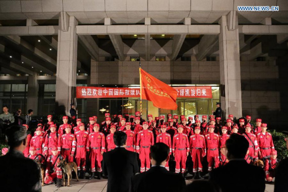 The China International Search and Rescue team arrives at the Beijing Capital International Airport in Beijing, May 8, 2015. The team left Nepal on Friday after completing a 12-day quake rescue and relief operation, as one of the first heavy Urban Search and Rescue (USAR) team in Nepal after the earthquake on April 25. (Xinhua/Zhang Lupeng)