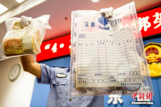 Police have seized about 2.8 Hong Kong dollars and are working to retrieve the rest of the ransom. (Photo: China News Service/Long Yuyang)