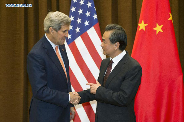 Chinese Foreign Minister Wang Yi (R) holds talks with US Secretary of State John Kerry in Beijing, capital of China, May 16, 2015. (Photo/Xinhua)