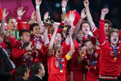 Bayern Munich's players celebrate their victory after winning their 2013 FIFA Club World Cup final match against Raja Casablanca in Marrakesh, Morocco, Dec. 21, 2013. Bayern won 2-0. (Xinhua/Cui Xinyu)