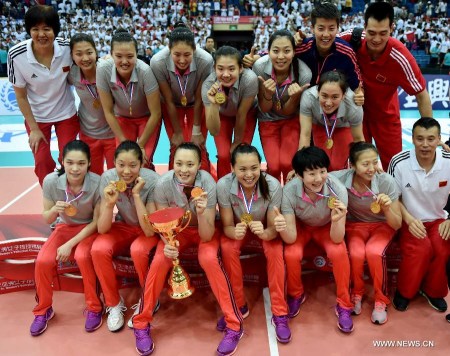 Team China pose with medals after the awarding ceremony at the 18th Asian Senior Women's Volleyball Championships in Tianjin, north China, May 28, 2015. China won 3-0 in the final against South Korea to claim the title. (Xinhua/Zhang Chenlin)