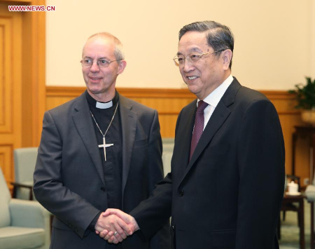 Yu Zhengsheng (R), chairman of the National Committee of the Chinese People's Political Consultative Conference, meets with Archbishop of Canterbury Justin Welby in Beijing, capital of China, May 28, 2015. (Xinhua/Yao Dawei)