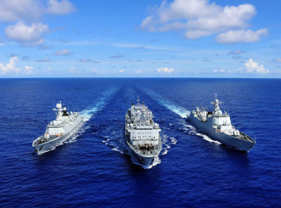 The missile destroyer Haikou (R), missile frigate Yueyang and supply ship Qiandaohu (C) are seen during the supply at sea in Pacific Ocean, during the Rim of the Pacific (RIMPAC) multinational naval exercises, on June 13, 2014. (Photo/Xinhua)