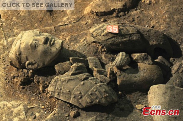 Relics are seen at the No. 2 pit of the Museum of Qin Shihuang Terracotta Warriors and Horses in Xi'an, capital of Northwest China's Shaanxi province, April 30, 2015. 