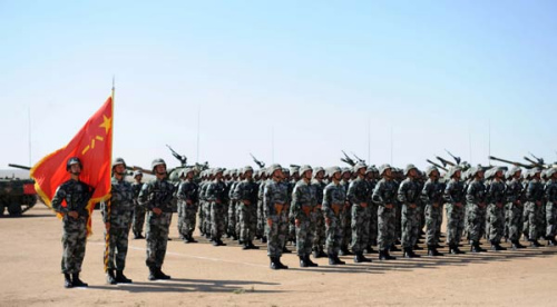 Chinese soldiers attend the closing ceremony of the Peace Mission - 2014 military drill in Zhurihe, North China's Inner Mongolia autonomous region, Aug 29, 2014. [Photo/Xinhua]