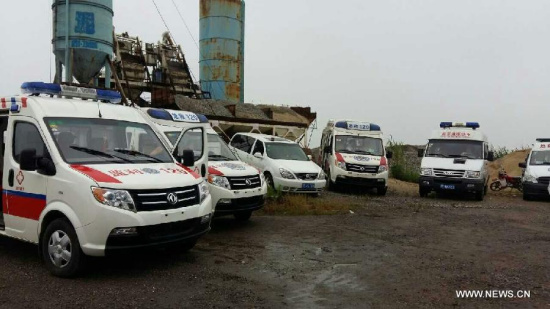 Ambulances are ready for rescue work near the site of the overturned passenger ship in the Jianli section of the Yangtze River in central China's Hubei Province June 2, 2015.(Xinhua) 
