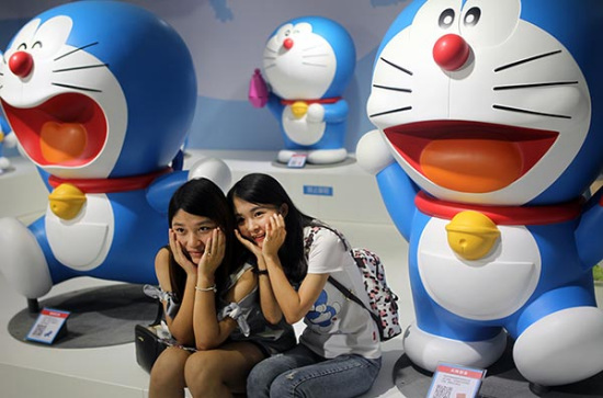 Fans of the popular Japanese cartoon character Doraemon visit a special exhibition marking the 45th anniversary of the Doraemon manga series at Joy City mall in Beijing. Photo provided to China Daily