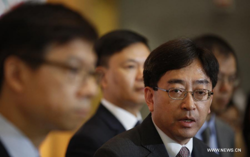 Hong Kong's Secretary for Food and Health Ko Wing-man attends a press conference in Hong Kong, south China, June 8, 2015. The Hong Kong Special Administrative Region government Monday raised its Middle East Respiratory Syndrome (MERS) response level to serious and advised the public to avoid traveling to South Korea. (Xinhua/Lui Sui Wai)