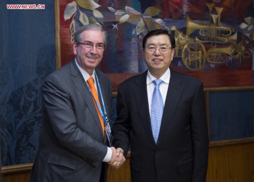 Zhang Dejiang(R), chairman of the Standing Committee of the National People's Congress (NPC) of China, meets with Eduardo Cunha,president of the Brazilian Chamber of Deputies,in Moscow,Russia,June 8,2015. (Xinhua/Xie Huanchi)