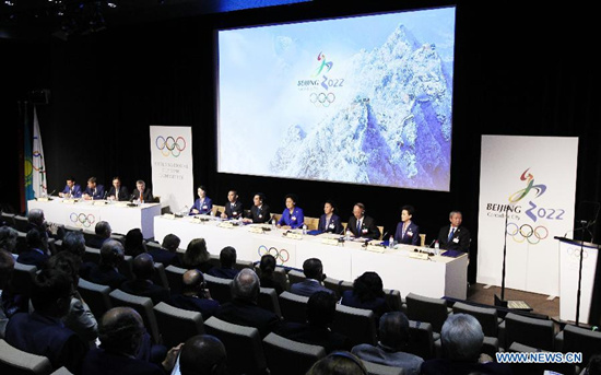 A general view shows the China Beijing 2022 Winter Olympics bid delegation groups at the presentation of Beijing Candidate City's bid for the 2022 Winter Olympic games, at the IOC Museum in Lausanne, Switzerland, on June 9, 2015. (Xinhua/Zhou Lei)