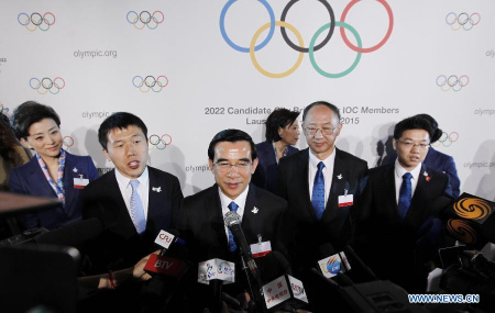 Wang Anshun (C), President of the Beijing 2022 bid committee and Mayor of Beijing, addresses to the media after the briefing for International Olympic Committee (IOC) members by the 2022 Winter Olympic Games candidate city of Beijing at the IOC Museum in Lausanne, Switzerland, on June 9, 2015. (Xinhua/Zhou Lei)