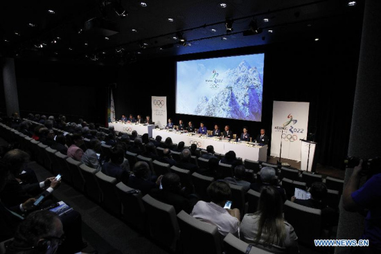 A general view shows the China Beijing 2022 Winter Olympics bid delegation groups at the presentation of Beijing Candidate City's bid for the 2022 Winter Olympic games, at the IOC Museum in Lausanne, Switzerland, on June 9, 2015. (Xinhua/Zhou Lei)