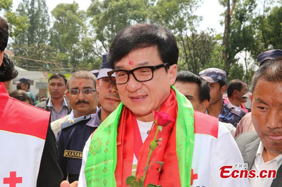 Hong Kong star Jackie Chan joins a Chinese delegation delivering earthquake relief supplies to Kathmandu, Nepal, June 9, 2015. The China Red Cross Society, Jackie Chan Charitable Foundation Beijing, and Taobao Found, under China Red Cross Society, jointly sponsored 5000 family kits, worth a total of four million yuan ($644,000 U.S. dollars). (Photo: China News Service/Fu Yongkang)