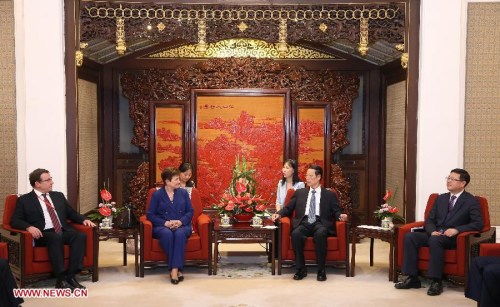 Chinese Vice Premier Zhang Gaoli (2nd R) meets with foreign advisors to solicit their opinions on the environment for China's 13th five-year plan in Beijing, capital of China, June 9, 2015. (Xinhua/Pang Xinglei)