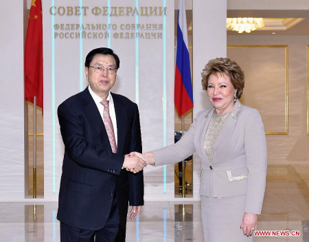 Zhang Dejiang (L), chairman of the Standing Committee of China's National People's Congress, shakes hands with Valentina Matviyenko, chairwoman of Russia's Federation Council, in Moscow, Russia, June 9, 2015. (Xinhua/Li Tao)