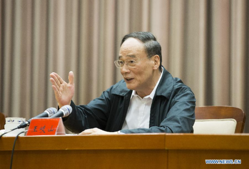 Wang Qishan, a member of the Standing Committee of the Political Bureau of the Communist Party of China (CPC) Central Committee and secretary of the CPC Central Commission for Discipline Inspection (CCDI), addresses a meeting on disciplinary inspection, in Beijing, capital of China, June 23, 2015. (Photo: Xinhua/Huang Jingwen)