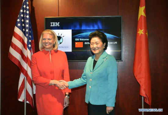 China's Vice Premier Liu Yandong (R) and President and CEO of the International Business Machines Corporation (IBM) Ginni Rometty shake hands during Liu's visit to the company, in Washington D.C., the United States, on June 23, 2015. (Photo: Xinhua/Wang Lei)
