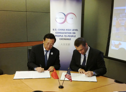 Vice Minister of Education Hao Ping and NBA China CEO David Shoemaker sign the Memorandum of Understanding for the expanded partnership between the NBA and the Ministry of Education during the US-China High-Level Consultation on People-to-People Exchange (CPE) in Washington, D.C on June 24. Photo provided for chinadaily.com.cn