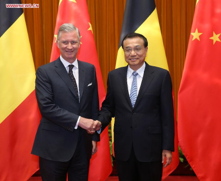 Chinese Premier Li Keqiang (R) shakes hands with King Philippe of Belgium during their meeting in Beijing, China, June 24, 2015. (Xinhua/Pang Xinglei)