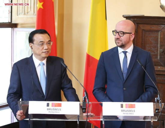 Chinese Premier Li Keqiang (L) and Belgian Prime Minister Charles Michel attend a joint press conference after their talks in Brussels, Belgium, June 29, 2015. (Photo: Xinhua/Yao Dawei)