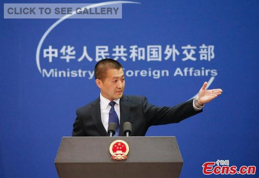 Lu Kang, the new spokesman of Foreign Ministry, gestures during a press conference in Beijing, June 15, 2015. Lu admitted modestly to being a little nervous on his debut as a Foreign Ministry spokesman on Monday, despite a diplomatic career spanning 22 years. (Photo: China News Service/Liu Guanguan)