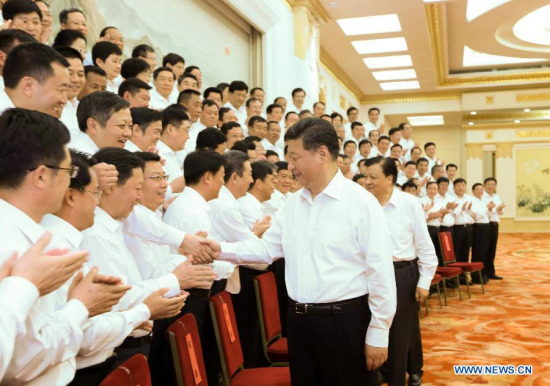 Top Communist Party of China (CPC) and state leaders Xi Jinping and Liu Yunshan meet with county-level Party secretaries who are honored for their outstanding work in Beijing, capital of China, June 30, 2015. (Xinhua/Lan Hongguang)