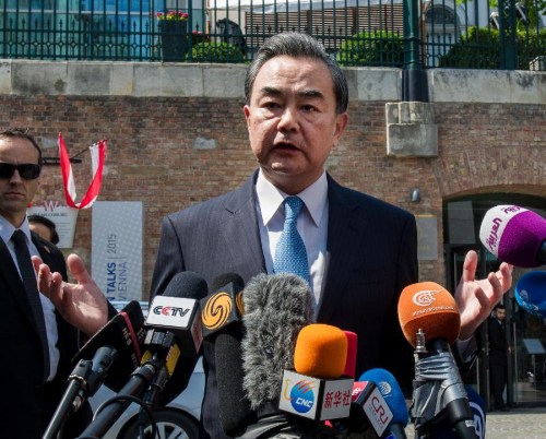 Chinese Foreign Minister Wang Yi is interviewed by media in Vienna, Austria, on July 2, 2015. In resolving outstanding Iran's nuclear issue, the Chinese side continues to play a constructive part, Chinese Foreign Minster Wang Yi said here on Thursday. (Photo: Xinhua/Qian Yi)