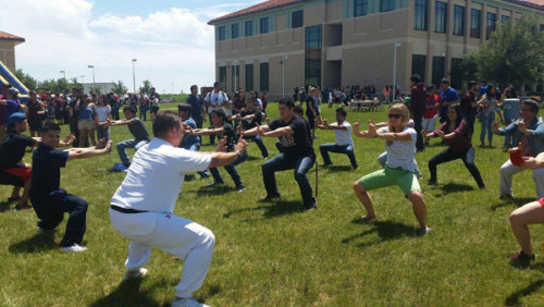 Project Pengyou hosted a Martial Arts activity practicing Wushu and Taichi at the Pre-Exam Jam at Texas A&M International University this April. (Photo/Provided to China Daily)