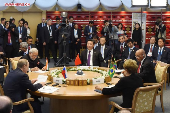 Chinese President Xi Jinping, Russian President Vladimir Putin, Brazilian President Dilma Rousseff, Indian Prime Minister Narendra Modi and South African President Jacob Zuma attend a small-group meeting of the 7th BRICS summit in Ufa, Russia, July 9, 2015. (Photo: Xinhua/Xie Huanchi)