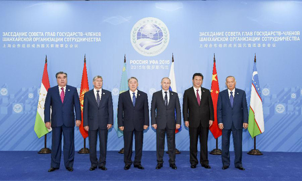 Chinese President Xi Jinping (2nd R) and other leaders of the Shanghai Cooperation Organization (SCO), Presidents of Tajikistan Emomali Rahmon (L), Kyrgyzstan Almazbek Atambayev (2nd L), Kazakhstan Nursultan Nazarbayev (3rd L), Russia VladimirPutin(3rd R) and Uzbekistan Islam Karimov (R), pose for a group photo before the 15th SCO summit in Ufa, Russia, July 10, 2015. (Xinhua/Li Xueren)