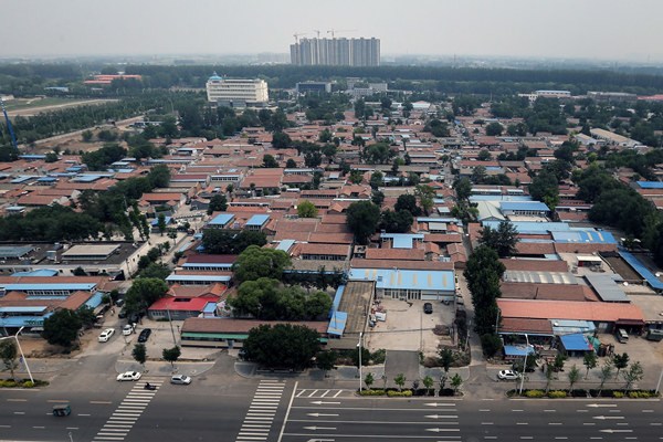 Demolition starts in Lucheng, Tongzhou district, proposed site of the subsidiary administrative center, in June. (Photo by Hei Ke/China Daily)