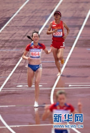 Zhang won a bronze medal on Wednesday in 10,000m barefoot after her right-foot sneaker had been stripped off when her follower stepped on her heel in the middle of the race.