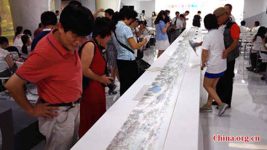 Painting scroll Jingji Winter Joy is on display at Beijing Olympic Museum on Friday, July 10, 2015. PhotoChina.org.cnChen Boyuan