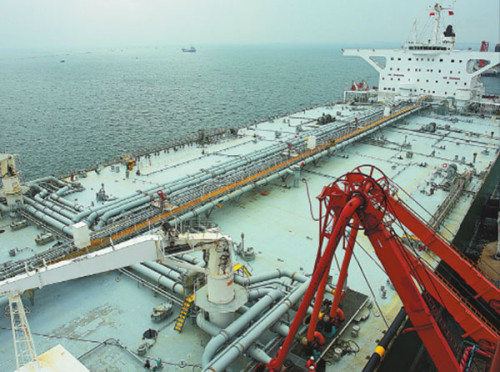 A crude oil tanker at Zhanjiang Port. As a key port city in South China, Zhanjiang is embracing a rapidly emerging ocean economy driven by maritime industries, port logistics and sea-related tourism. (Photo/China Daily)