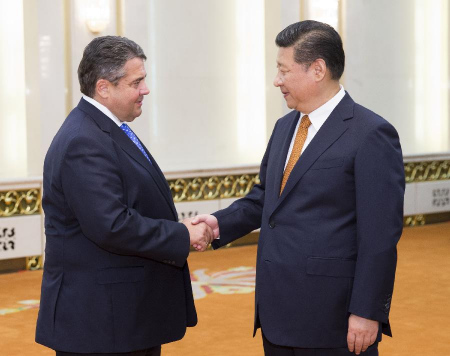Chinese President Xi Jinping (R) meets with German Vice Chancellor and Minister for Economic Affairs and Energy Sigmar Gabriel, also chairman of the Social Democratic Party(SPD) of Germany, in Beijing, capital of China, July 15, 2015. (Photo: Xinhua/Wang Ye)
