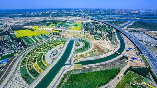 File photo taken on May 18, 2015 shows one part of the South-to-North Water Diversion Middle Route Project in Zhengding County, north China's Hebei Province. (Photo/Xinhua)