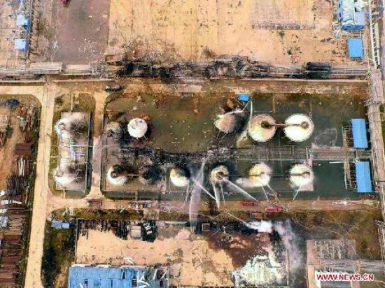 Photo taken on July 17, 2015 shows the scene where a fire has been extinguished at a petrochemical plant in Rizhao, east China's Shandong Province. (Photo/Xinhua)