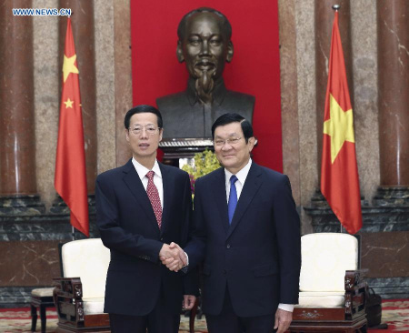 Chinese Vice Premier Zhang Gaoli (L), who is also a member of the Standing Committee of the Political Bureau of the Communist Party of China Central Committee, meets with Vietnamese President Truong Tan Sang in Hanoi, Vietnam, July 17, 2015. (Photo: Xinhua/Lan Hongguang)