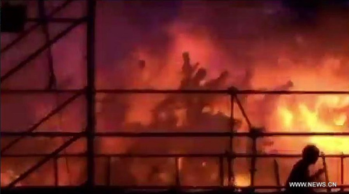 The video grab taken on June 27, 2015 shows the scene where a fire took place at a park in New Taipei, southeast China's Taiwan. (Photo/Xinhua)