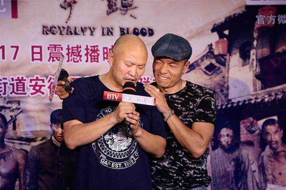 Director Gong Zhaohui (left) and actor Wang Ting at the Royalty in Blood. (Photo provided to chinadaily.com.cn)