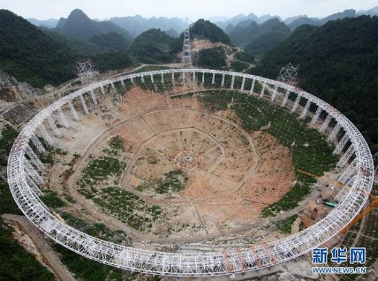 Photo taken on July 16 2014 shows the construction site of the world's largest radio telescope deep in the mountains of southwest China's Guizhou Province. (Photo/Xinhua)