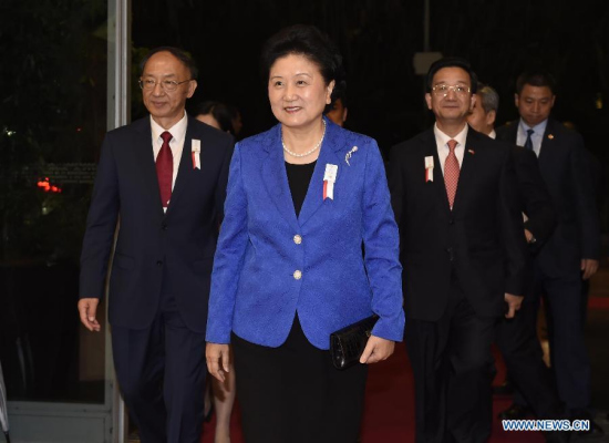 Chinese vice premier Liu Yandong (C), head of the Beijing 2022 Winter Olympics bid team, arrives for the opening ceremony of the 128th Session of the International Olympic Committee (IOC) at the Kuala Lumpur Convention Centre in Kuala Lumpur, Malaysia, July 30, 2015. (Photo: Xinhua/Gong Lei)