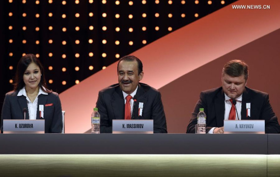 Kazakhstan's Prime Minister Karim Massimov (C) answers questions after Almaty's 2022 Olympic Winter Games bid presentation at the 128th International Olympic Committee (IOC) session in Kuala Lumpur, Malaysia, on July 31, 2015. The session will decide the host cities of the 2022 Olympic Winter Games and the 2020 Youth Olympic Winter Games.(Photo: Xinhua/Gong Lei)