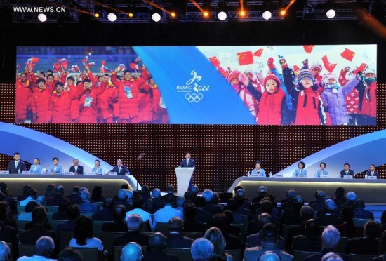 Members of the Beijing's 2022 Olympic Winter Games bid presentation delegation attend the 128th IOC session in Kuala Lumpur, Malaysia, July 31, 2015. (Photo: Xinhua/Lui Siu Wai)