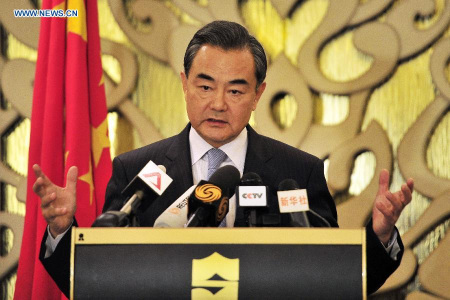 Chinese Foreign Minister Wang Yi addresses a news conference in Singapore, Aug. 3, 2015. Wang visited Singapore from August 2 to 3. (Photo: Xinhua/Then Chih Wey)