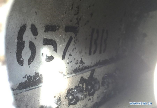 Photo taken on Jul.29, 2015, shows a piece of debris on Reunion Island. Verification had confirmed that the debris discovered on Reunion Island belongs to missing Malaysian Airlines flight MH370, Malaysian Prime Minister Najib Razak announced early Thursday. (Xinhua/Romain Latournerie)