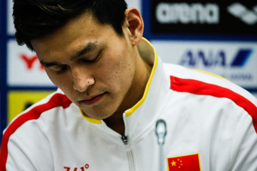 Chinese swimming star Sun Yang reacts during a press conference at the FINA World Championships in Kazan, Russia, Aug. 9, 2015. Sun Yang gave up his chance to defend his 1,500m freestyle title at the Kazan world championships as the 23-year-old withdrew from the final minutes before it started due to heart discomfort on Sunday. (Photo: Xinhua/Zhang Fan)