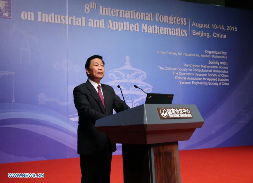 Chinese Vice President Li Yuanchao addresses the opening ceremony of the 8th International Congress on Industrial and Applied Mathematics in Beijing, capital of China, Aug. 10, 2015. (Photo: Xinhua/Liu Weibing) 